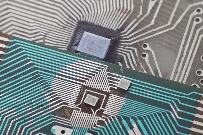 Microcontroller dies used in Brick Game, 1993, 2003, and 2008 (left to right)